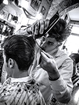 hairdresser doing a haircut